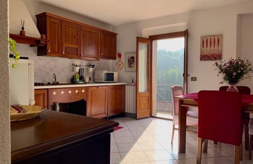 Plesio Apartment | Casa Savina: Breathtaking Lake Views & Private Garden