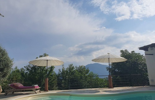 Scolca House | Relax at Casa Serena: Poolside Retreat for Families & Pets
