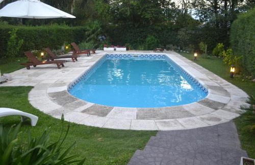 Villa General Belgrano House | Relax at Casa Simona Villa: 4-Star Poolside Oasis