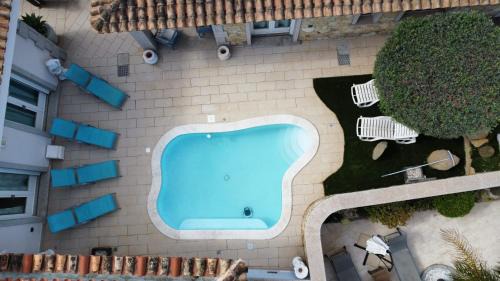 Cala Sinzias House | Relax at Casa Sinzias: Oceanfront Stay with Pool Access