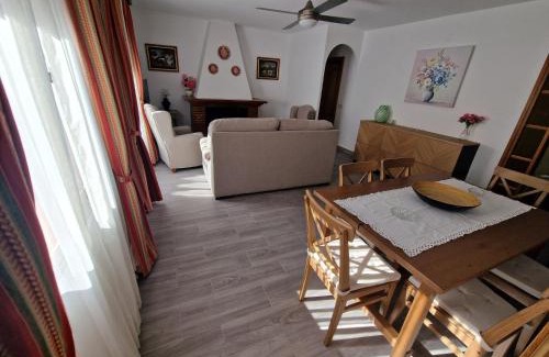 Grazalema Apartment | Stay at Casa Sofía en Grazalema with Cozy Fireplace