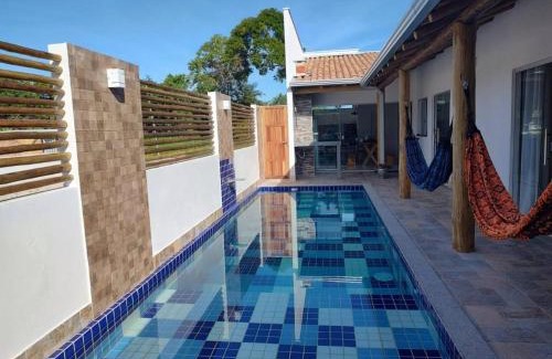 Prado House | Relax at Casa Sol: Oceanfront Pool and Family-Friendly Stay
