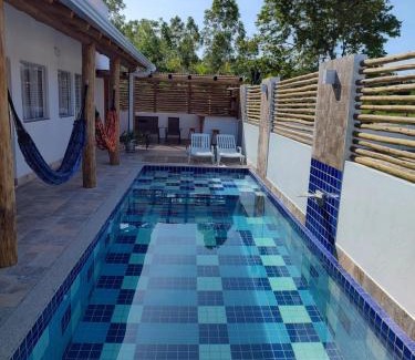 Prado House | Relax at Casa Sol: Oceanfront Pool and Family-Friendly Stay