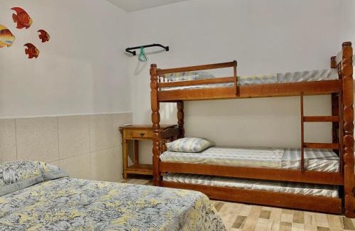 Centro House | Casa Sol Ubatuba - Suítes por Temporada