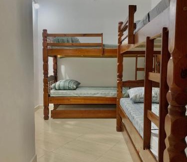 Centro House | Casa Sol Ubatuba - Suítes por Temporada