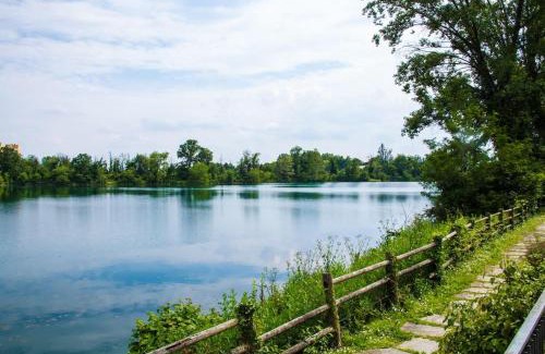 Milano San Felice Apartment | Idyllic Villa by Private Lake Steps from Milan