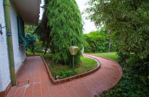Milano San Felice Apartment | Idyllic Villa by Private Lake Steps from Milan