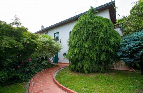 Milano San Felice Apartment | Idyllic Villa by Private Lake Steps from Milan