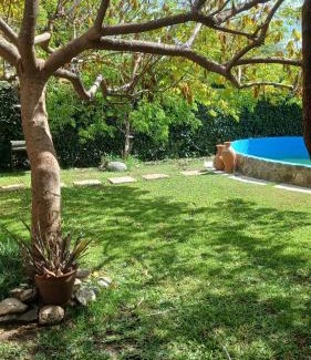 Merlo House | CASA TODA EN PLANTA BAJA CON PARQUE y PILETA INDIVIDUAL SOBRE ASFALTO A POCAS CUADRAS DEL CENTRO DE MERLO