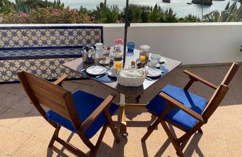 Portimao Bed & Breakfast | Experience Casa Três Palmeiras: Oceanfront Escape & Pool