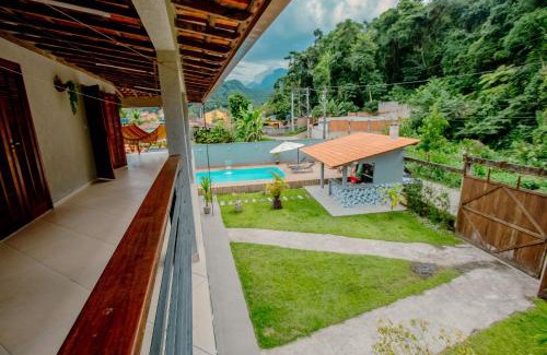 Mambucaba House | Seaside Retreat: Casa Tranquila with Pool & Pet-Friendly Perks