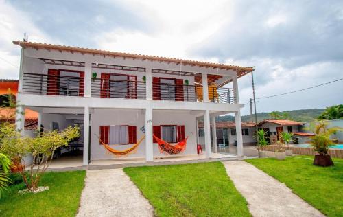 Mambucaba House | Seaside Retreat: Casa Tranquila with Pool & Pet-Friendly Perks