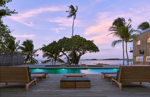 Guriu Village Hotel | Casa Uca: Oceanfront Haven with Spa and Pool Access