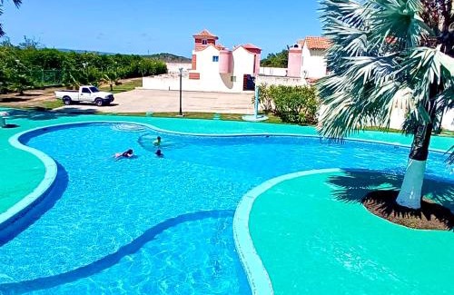 Tucacas House | Beachfront Bliss at Casa Vacacional de Playa Vip