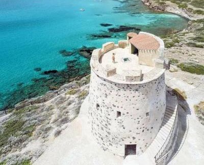 San Giovanni Suergiu House | Oceanfront Escape: Casa Vacanza Sa Prenda, Rated 9.6/10