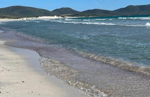 Carbonia House | Elegant Retreat: Casa Vacanze 10 km from the Beach