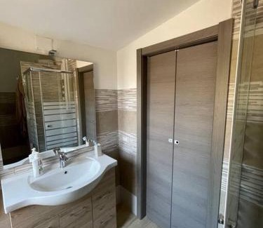 Carbonia House | Elegant Retreat: Casa Vacanze 10 km from the Beach