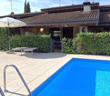 Manerba del Garda House | Family-Friendly Oceanfront Stay at Villino Vacanze "Il Porticciolo"
