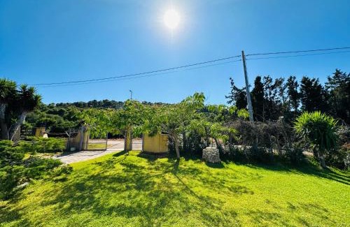 Porto Conte House | Experience Casa Vacanze: Oceanfront Bliss for Families