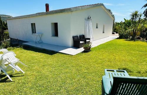 Porto Conte House | Experience Casa Vacanze: Oceanfront Bliss for Families