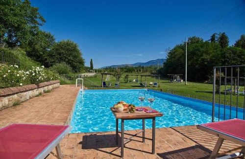 Laterina Apartment | Relax at Casa Vacanze Le Fornaci with Ocean Views & Pool