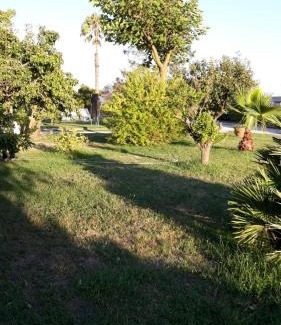 Nettuno Apartment | Idyllic Casa Vacanze nel Verde: Family-Friendly Retreat