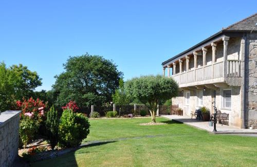 Friol House | Immerse in Comfort at Casa Vilar de Friol, 4-Star Retreat