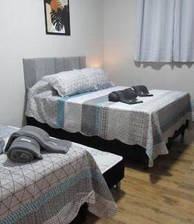 Serra Negra House | Casa1sn - Casa completa com jardim privativo e chuveirão refrescante!
