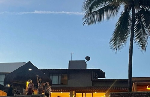 Barra de Sao Miguel House | CasaB standing on the sand in Barra.