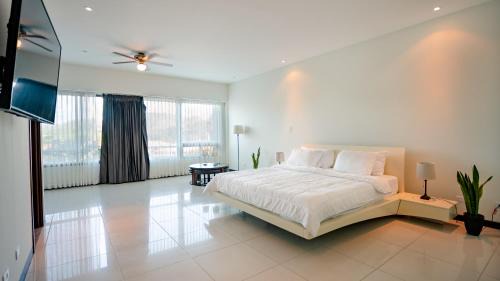 Carrillos Apartment | Experience CasaGuana: Oceanfront Bliss with Pool & Hot Tub