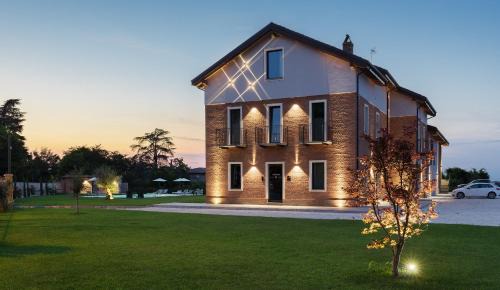 Codevilla Bed & Breakfast | Discover Casale Auriga: Oceanfront Stay with Pool & Dining
