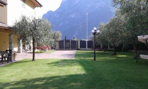 Riva del Garda Apartment | Discover CasaVarone: Oceanfront Retreat with Pool Access