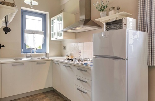 Roddi House | Elegant Cascina Arcangelo Raffaele with Ocean View Amenities