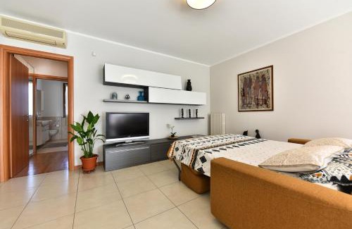 Cernusco sul Naviglio Apartment | Elegant Masai Mara House with Spacious Balcony & Family-Friendly