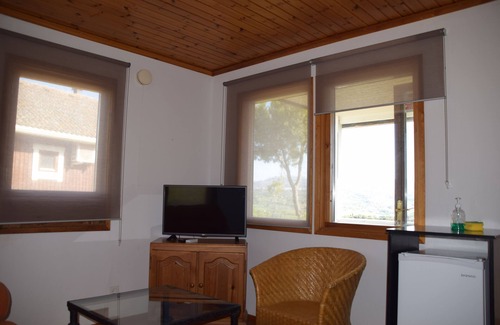 Ronda Cabin | Cozy Casita de Madera with Pool and Scenic Views