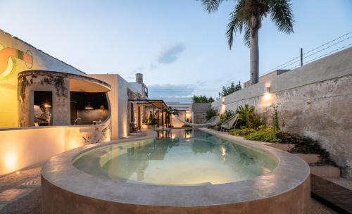 Centro Hotel | Experience Casona Origen Merida: Oceanfront Family Retreat