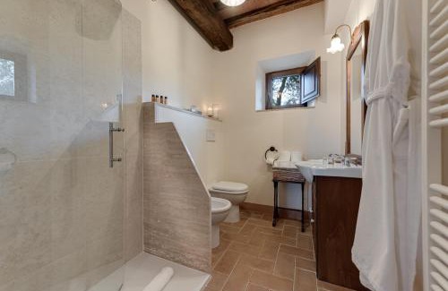 Sant'Angelo In Colle Apartment | Elegant Castel Brunello: Oceanfront Escape with Pool Access
