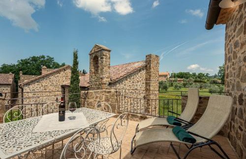 Sant'Angelo In Colle Apartment | Elegant Castel Brunello: Oceanfront Escape with Pool Access