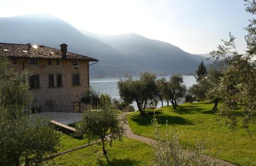 Peschiera Maraglio Apartment | Explore Castello Oldofredi: 4-Star Oceanfront Oasis