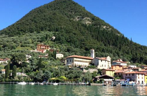 Peschiera Maraglio Apartment | Explore Castello Oldofredi: 4-Star Oceanfront Oasis
