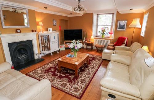 Kidwelly House | Pet-Friendly Castle School House: 4-Star Guest Rated Stay