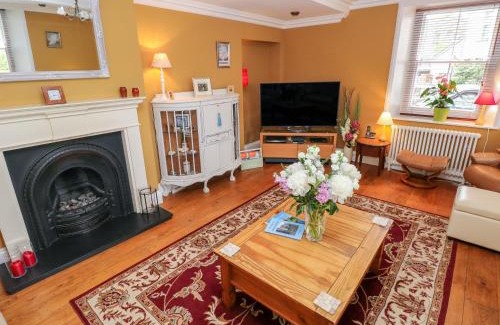 Kidwelly House | Pet-Friendly Castle School House: 4-Star Guest Rated Stay