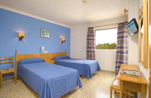 San Antonio Bay Hotel | Relax at Hotel Bahia Playa with Pool & Ocean Views