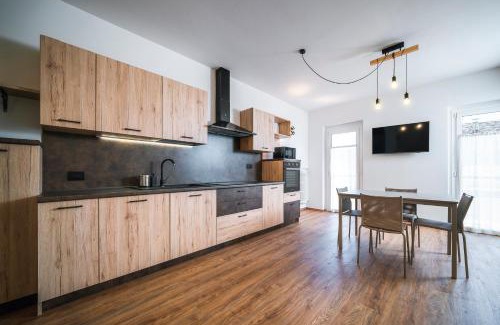 Cavalese Apartment | Pet-Friendly Cauriol Suites: 4-Star Getaway with High Reviews