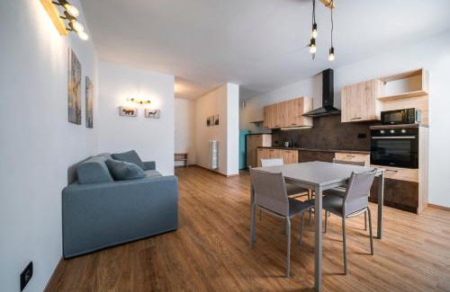 Cavalese Apartment | Pet-Friendly Cauriol Suites: 4-Star Getaway with High Reviews