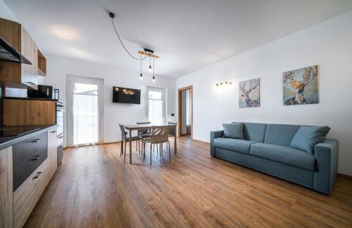 Cavalese Apartment | Pet-Friendly Cauriol Suites: 4-Star Getaway with High Reviews