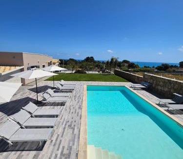 Brucoli Villa | Top-Rated Cava Del Sol: Oceanfront Bliss with Pool Access