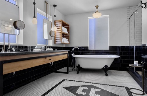 College Station Hotel | Inviting Cavalry Court: Eco-Friendly Stay with Top Amenities