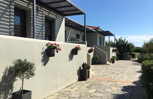 Moudros Apartment | Discover Caviro: 4-Star Oceanfront Hotel with Pool & Hot Tub