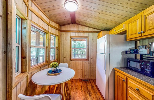 Waller Cabin | Beautiful Cedar Cabin with Beach, Pond & Tropical Bar
